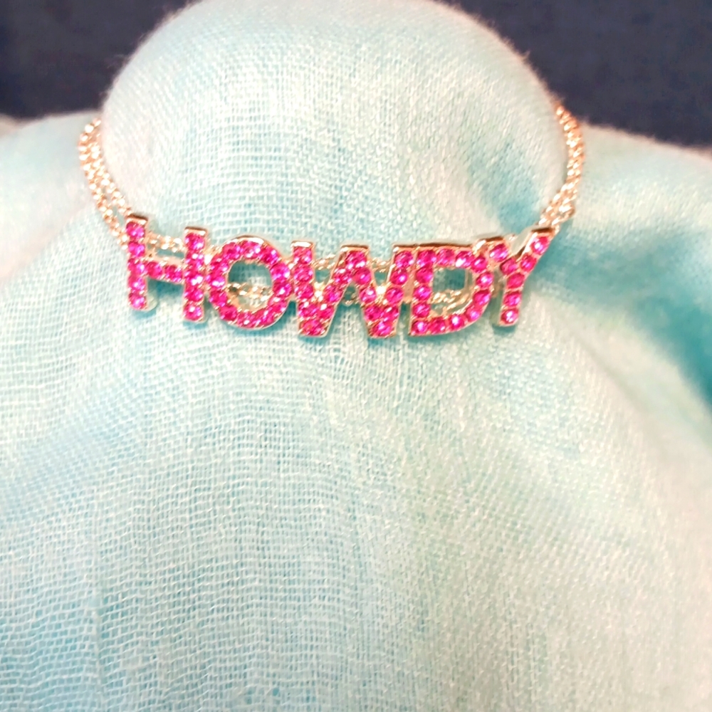 8-24 banana Republic pink rhinestones and silvertone braclet